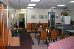 Eating area with the kitchen on the right