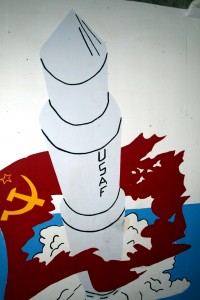On the wall at the base of the elevator shaft