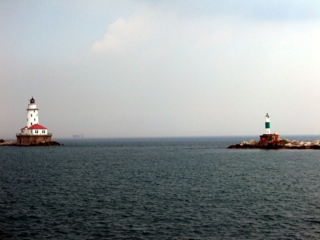Chicago Harbor Lighthouse with the light that marks the opposite breakwater